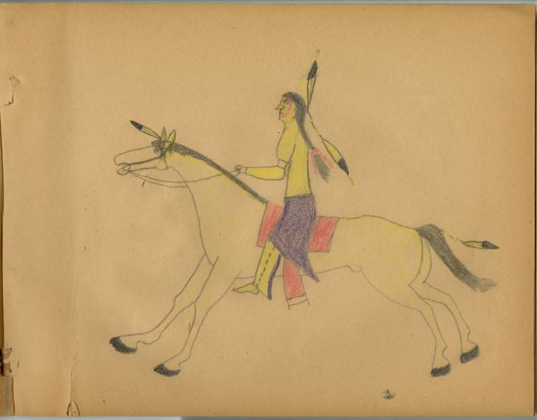 Man in yellow shirt riding yellow horse